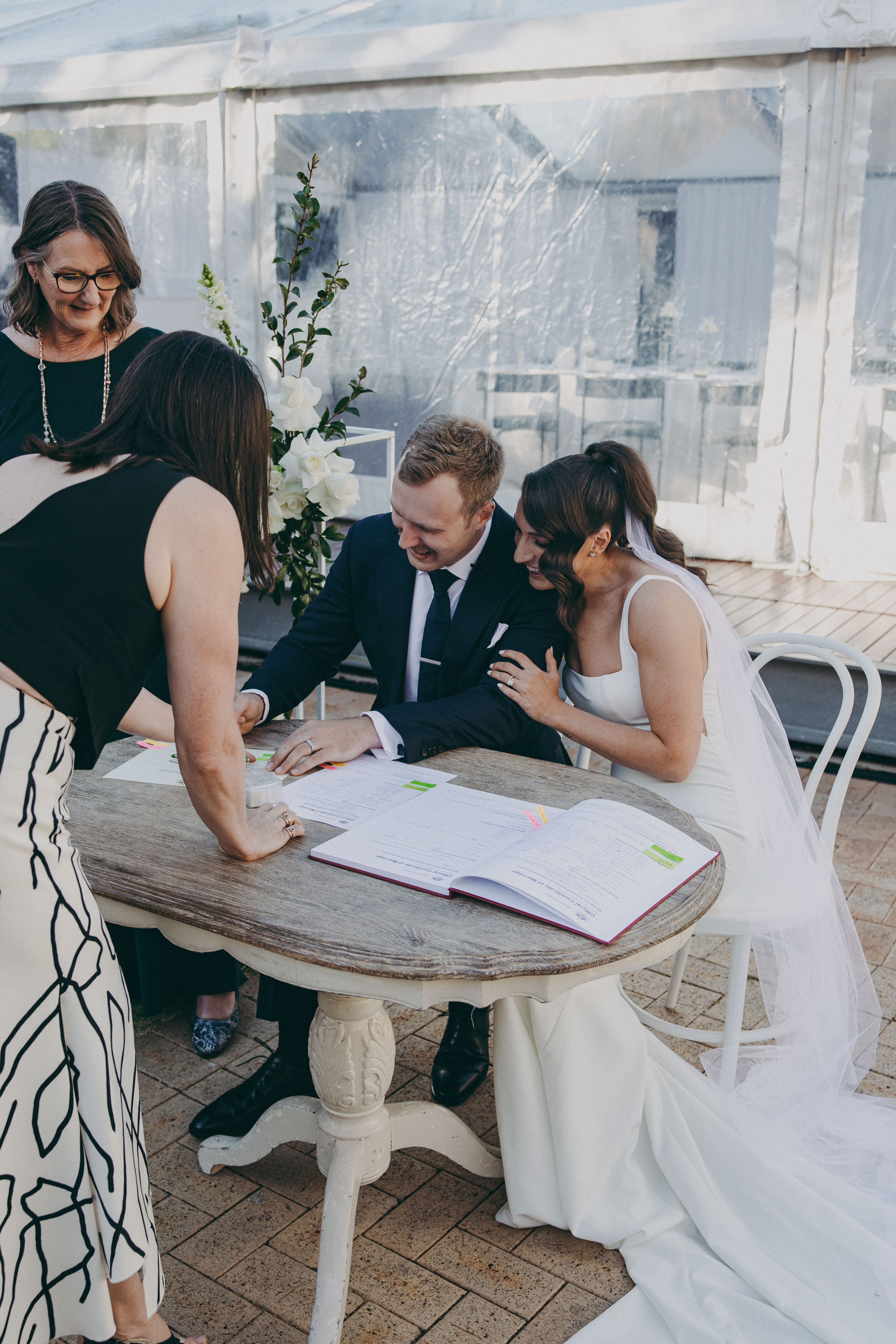 Alice officiating as groom greets ring bearer